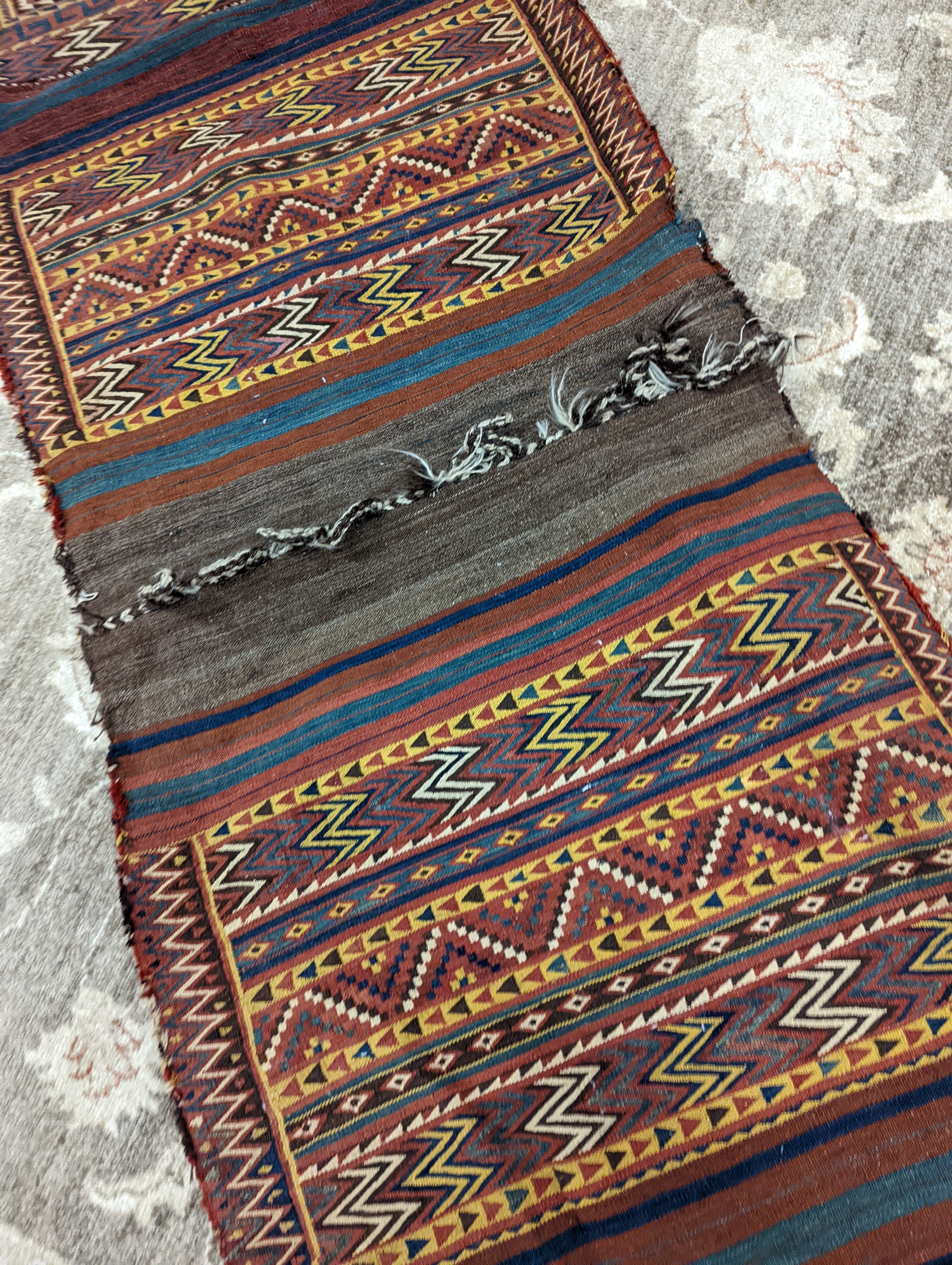 An Afghan Kelim bag/wall hanging, 280 x 78cm